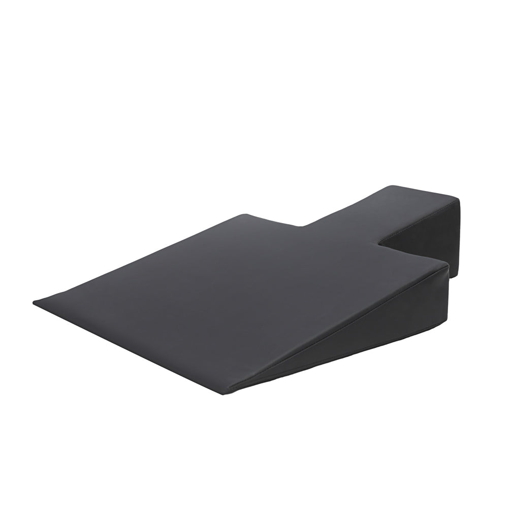 Black Pilates Reformer Wedge for floor exercise