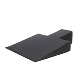 Black Pilates Reformer Wedge for floor exercise