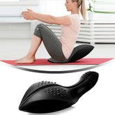Woman using Dolphin Spine Corrector for Pilates