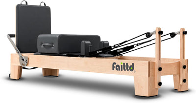 A Pilates reformer machine made by the brand Faittd. 